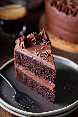 ₱80 Chocolate cake. Flavored with melted chocolate, cocoa powder, or both. It can also have other ingredients such as fudge, vanilla creme, and other sweeteners.
